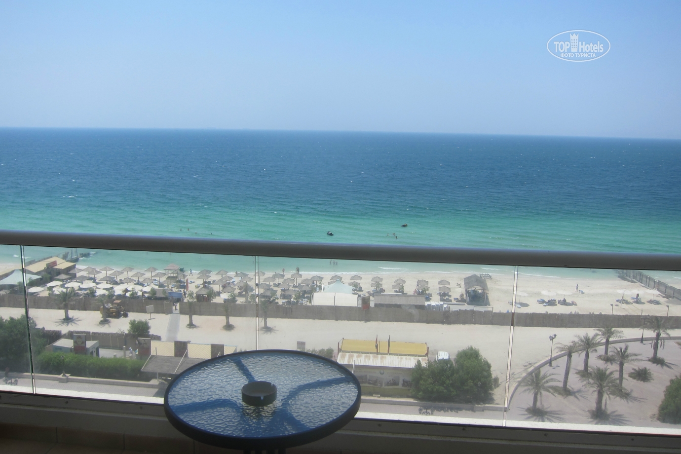 Ramada beach hotel ajman. Рамада Бич Аджман балкон. Ramada Beach Hotel Ajman фото. Аджман Бич 4 звезды. Ajman Beach Drone.